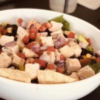 Black Bean Salad · A bed of romaine lettuce is loaded with warm black beans, smoked brisket or grilled chicken,...