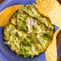 Chunky Guacamole Dip · Our chunky guacamole made with diced avocado, onions, tomatoes and cilantro.