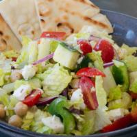 Chop Salad · Romaine, chickpeas, olives, feta cheese, cucumber, red onion, bell pepper, tomato, pita cris...