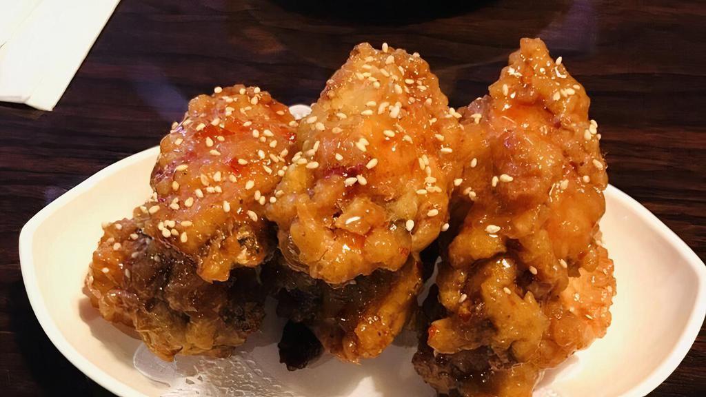 Chicken Wings · Spicy or soy garlic.