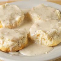 Biscuits And Gravy (2) · Fresh baked biscuits smothered with white pepper gravy.