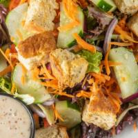 Mixed Greens · Vegan and gluten free. Tomatoes, red onions, cucumbers, carrots and biscuit croutons. Add pu...