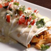 Burrito San José · New. 10-inch burrito stuffed with grilled chicken, chorizo, sour cream, rice, and beans topp...