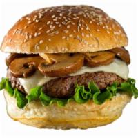 Mushroom Swiss Burger · Half pound sirloin beef burger layered in grilled mushrooms, onions, and cheese.