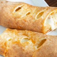 Stromboli · Filled with mozzarella and your choice of two toppings.