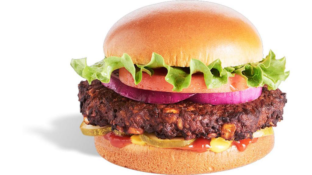 Black Bean Burger · Chipotle seasoned black bean burger served with lettuce, tomato, red onion, pickles, mustard and ketchup
