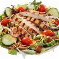 Back Yard Chicken Salad · Choose from flame-grilled, blackened or breaded chicken strips over fresh greens with ripe t...
