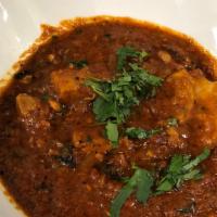Chicken Kerala Curry · Chicken Simmered in Coconut Curry Sauce, Mustard, Dried Red Chilies, Curry Leaves