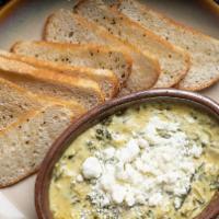 Spinach & Artichoke Dip · Melted feta cheese, toasted ciabatta crisps. Add blackened gulf shrimp for an additional cha...