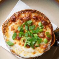 French Onion Soup Au Gratin · Caramelized onion, rich beef broth, swiss & provolone.