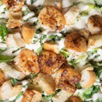 Gulf Shrimp Caesar Salad · Grilled or fried gulf shrimp, classic caesar salad. Substitute grilled or fried chicken tend...