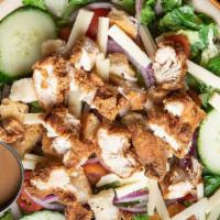 Crispy Chicken Salad · Crispy fried chicken, cheddar, tomato, red onion, cucumber, spring mix, croutons.