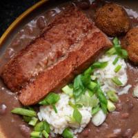 Creole Red Beans & Rice · Smoked sausage, jalapeño hushpuppies. Add blackened or fried chicken tenders for an addition...