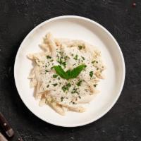 Alfredo Pasta · Penne pasta cooked al dente with chicken tossed in creamy white sauce topped aged parmesan. ...