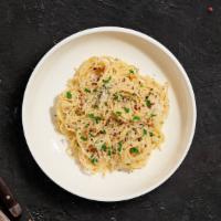 Garlic Butter Pasta · Golden garlic butter sauce blend cooked with spaghetti. Served with bread.