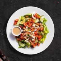 Greek Salad · Romaine lettuce with English cucumbers, red onions, kalamata olives, cherry tomatoes, feta c...