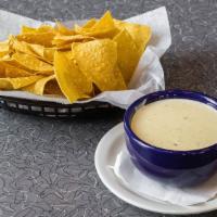 Homemade Cheese Dip With Chips · Add homemade chili for an additional cost.