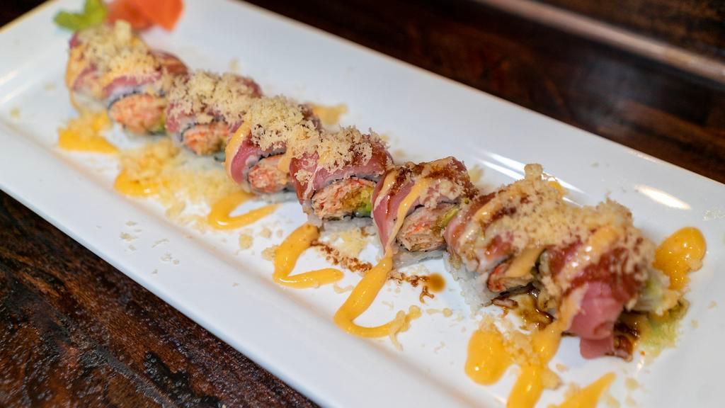 Honey Roll · Spicy crabmeat, steam shrimp, tuna, crunch, and chef's special sauce.