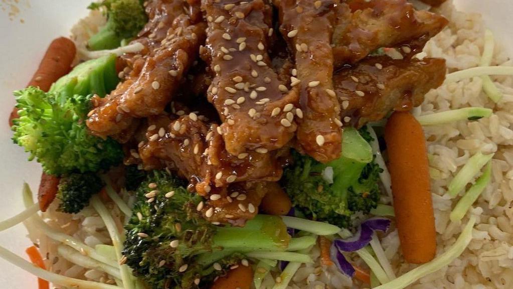 Teriyaki Bowl · Brown rice, quinoa, broccoli, carrots, chik'n strips, teriyaki sauce.