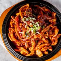 Chulpan Ojinguh Bokeum · Stir fried squid and vegetables(bell pepper, carrot, zucchini, green onion, mushroom, jalape...
