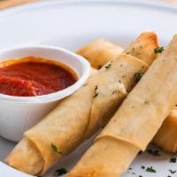 Lebanese Cheese Rolls · Served With Italian Tomato Sauce