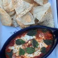 Baked Feta Dip · Tomato sauce, roasted red peppers, house cheese blend, feta cheese. . Served with pita chips...