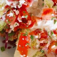 Wedge Salad · lettuce, tomatos, red onion, bacon, feta cheese, creamy feta