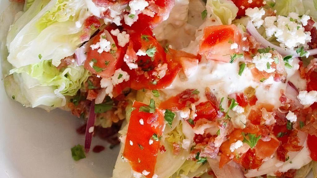 Wedge Salad · lettuce, tomatos, red onion, bacon, feta cheese, creamy feta