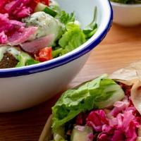 Falafel Wrap · Romaine, Baby Kale, Marinated Cabbage, Tomato, Parsley, Schug Tahini, Arabic Bread