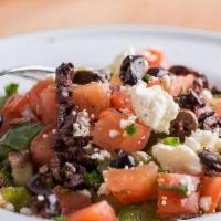 Mini Greek Salad · Tomato, Bell Pepper Cucumber, Pickled Red Onion, Feta Cheese, Kalamata Olives, Red Wine Vina...