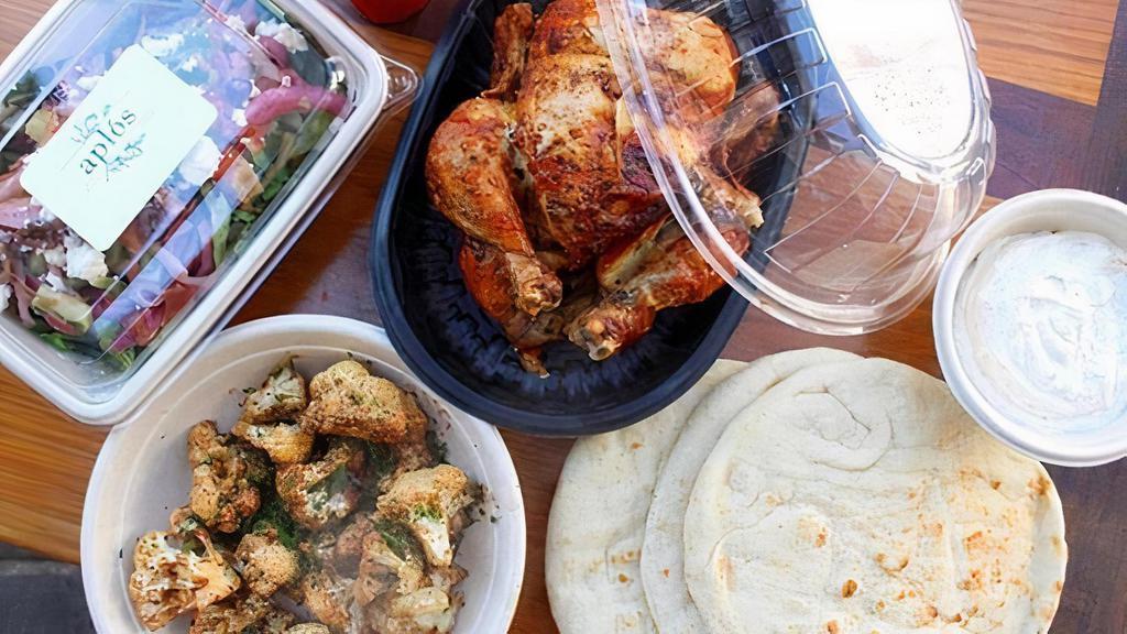Whole Chicken Dinner · Spit Roasted Rotisserie Chicken served with choice of side, salad, pita bread, and choice of sauce.