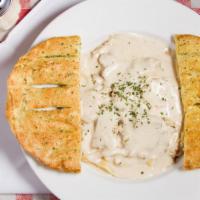 Fettuccini Alfredo · With a Hint of Pepper, Our Rich and Creamy Alfredo Sauce is Served atop Your Choice of Marin...