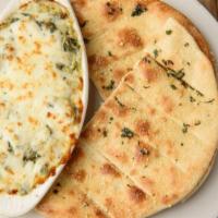 Spinach And Artichoke Dip · Creamy Mixture of Spinach, Artichoke Hearts and Cheeses. Served Bubbling Hot with Our Fresh-...