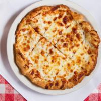 Garlic Bread · Fresh-Baked Pizza Dough Brushed with Zesty Garlic Sauce and Topped with Mozzarella.
