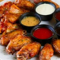 Italian Baked Chicken Wings · 8 Lightly Seasoned Wings Tossed with Italian Dressing. Served with Your Choice of Dipping Sa...