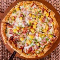 Hawaiian Pizza · A Classic! Topped with Cheese, Pineapple, Green Peppers and Canadian Bacon.
