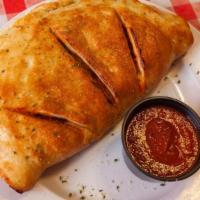 Create Your Own Cheese Calzone (Large) · Our Calzones are Folded Pies made with Fresh Dough, Stuffed with a Blend of Cheeses and Our ...