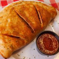 All Meat Calzone (Large) · Our Classic House-Made Pizza Sauce Topped with Pepperoni, Italian Sausage, Ground Beef, Crum...