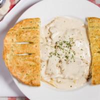 Fettuccini Alfredo · With a Hint of Pepper, Our Rich and Creamy Alfredo Sauce is Served Atop Your Choice of Marin...