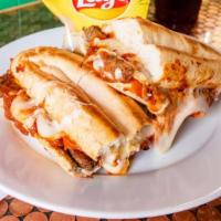 Meatball Poboy · Original Italian Pie Meatballs Smothered in Our Signature Marinara Sauce and Topped with Moz...