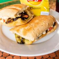 Roasted Eggplant Poboy · Roasted Eggplant Brushed with Garlic Butter and Topped with Fresh Mushrooms, Fresh Tomato, S...