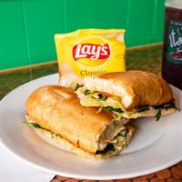 Spinach And Or Artichoke Poboy · Artichoke Hearts Brushed with Garlic Butter and Topped with Fresh Mushrooms, Sautéed Onions,...