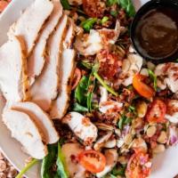 Large Thai Chicken Salad · Fresh Baby Spinach with Sliced Mushrooms, Toasted Almonds, Crumbled Bacon, Grape Tomatoes an...