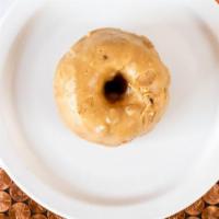 Praline Cake Doughnut · Over Sized Cake Doughnut Covered in Praline Sauce Cooked to Perfection.  Melts in your Mouth...