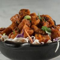 The Opener · Crispy flash fried pork belly tossed in our delicious Korean #2 sauce and served atop our fr...