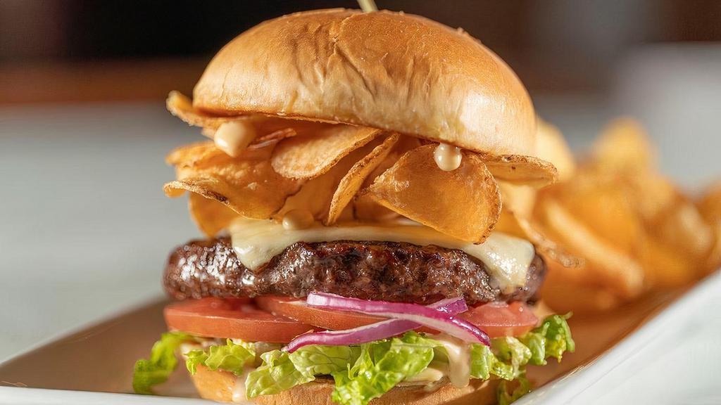Krunch Burger · Our award-winning steakburger is chargrilled and topped with our Homerun Burger Sauce, melted Coopers Sharp White American Cheese, and housemade chips. Served on a grilled brioche bun with a side of krunchy housemade chips.