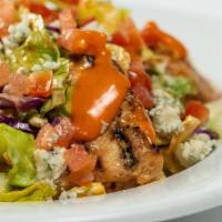 Buffalo Salad (Grilled Chicken) (Full Portion) · Grilled chicken, mild wing sauce, chopped romaine hearts, celery, tomatoes, carrots, cabbage...