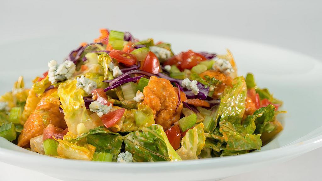 Fried Chicken Salad (Full Portion) · Mixed greens, carrots, cabbage, Monterey Jack and cheddar, tomatoes, red onions, and croutons topped with fried, sliced chicken. Served with choice of dressing (45-240 cal.).