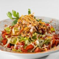 Southwest Bbq Chopped Salad (Half Portion) · Chopped romaine and tortilla strips, Southwest Ranch dressing, chilled BBQ chicken, tomatoes...