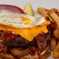 The Glory Burger®† · BBQ sauce, fried onion straws, bacon, cheddar, and a soft fried egg†. .